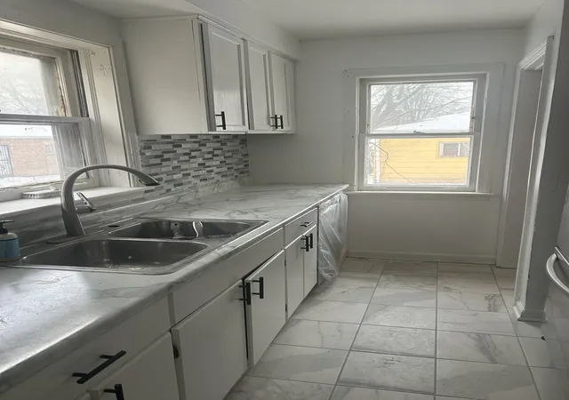 Photo 2 of Single family home for sale at 12748 S Lowe Ave, Chicago, IL 60628 | MLS# 12657969 | Listing updated on 2026-09-11