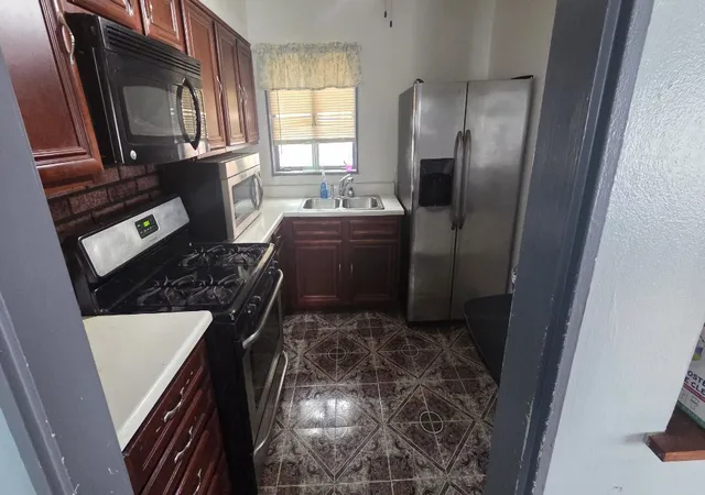 Photo 2 of Single family home for sale at 15409 Dobson Ave, Dolton, IL 60419 | MLS# 12659291 | Listing updated on 2026-08-04