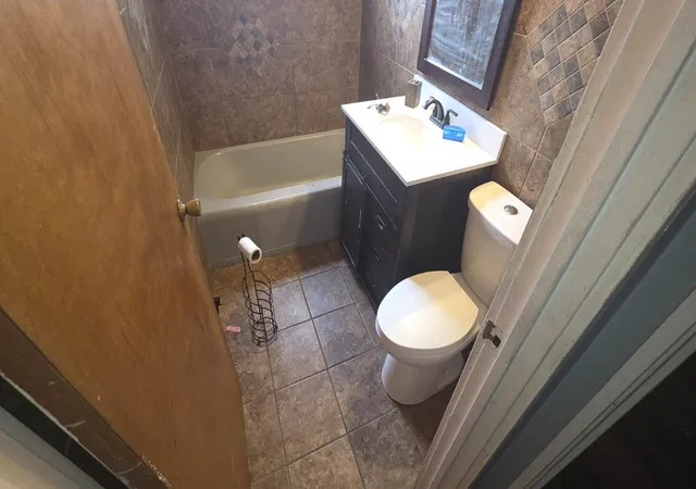 Photo 3 of Single family home for sale at 15409 Dobson Ave, Dolton, IL 60419 | MLS# 12659291 | Listing updated on 2026-08-04