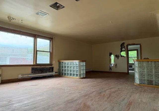 Photo 3 of Multi family home for sale at 7711 S Ada St, Chicago, IL 60620 | MLS# 12663763 | Listing updated on 2026-08-27