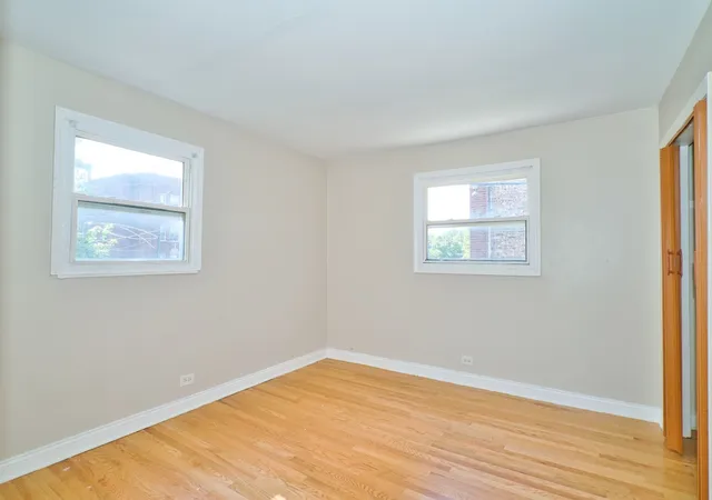 Listing Photo 2 - Condo for sale in building located at 118 N Menard Ave, Chicago, IL 60644 - Unit #