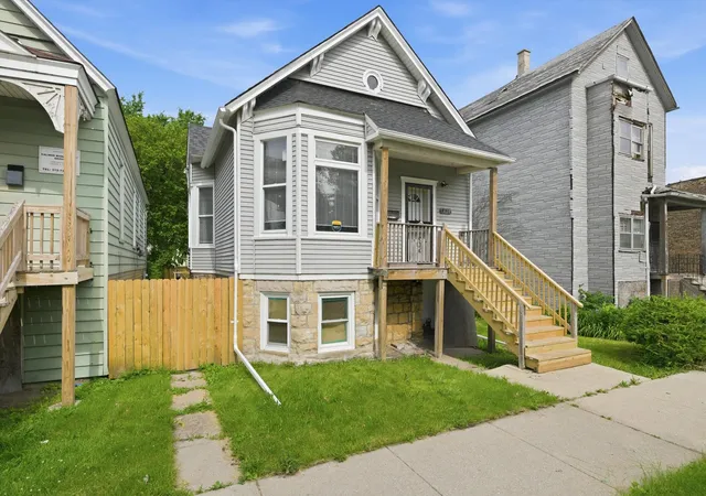 Photo 3 of Single family home for sale at 7828 S Escanaba Ave, Chicago, IL 60649 | MLS# 12671630 | Listing updated on 2026-06-24