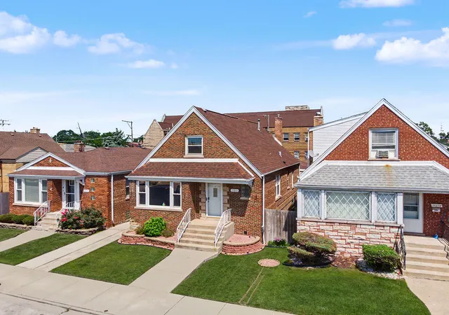 Photo 2 of Single family home for sale at 11011 S Ave L, Chicago, IL 60617 | MLS# 12686187 | Listing updated on 2026-09-15