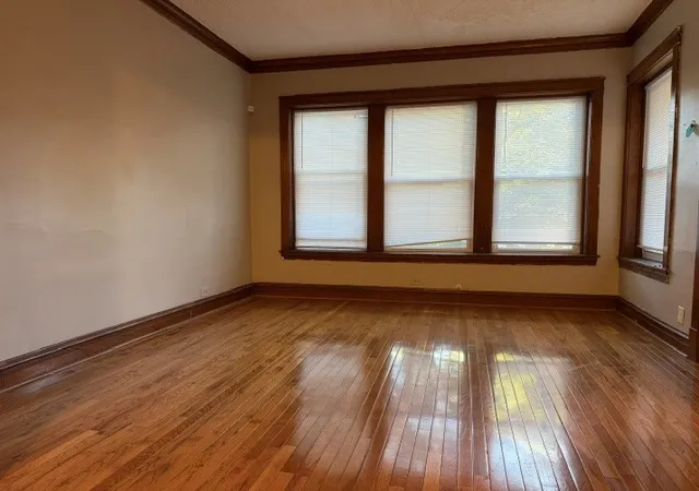 Photo 2 of Single family home for sale at 1515 N Lockwood Ave, Chicago, IL 60651 | MLS# 12686422 | Listing updated on 2026-10-21