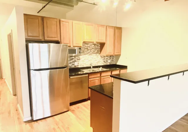 Photo 3 of Condo for sale at 1645 W Ogden Ave #310, Chicago, IL 60612 | MLS# 12695562 | Listing updated on 2026-09-29
