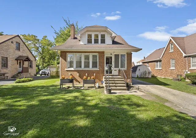 Single family home for sale at 117 N Reed St, Joliet, IL 60435 | MLS# 12698483