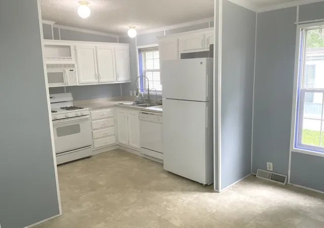 Photo 2 of Manufactured home for sale at 406 Spruce Dr, Belvidere, IL 61008 | MLS# 12702720 | Listing updated on 2026-08-07