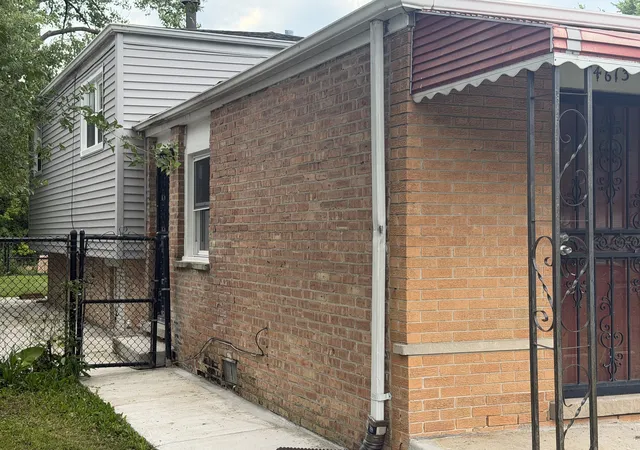 Photo 3 of Single family home for sale at 14613 Winchester Ave, Harvey, IL 60426 | MLS# 12703850 | Listing updated on 2026-09-06