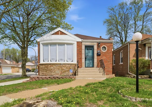 Photo 1 of Single family home for sale at 8801 S Clyde Ave, Chicago, IL 60617 | MLS# 12703982 | Listing updated on 2026-10-07