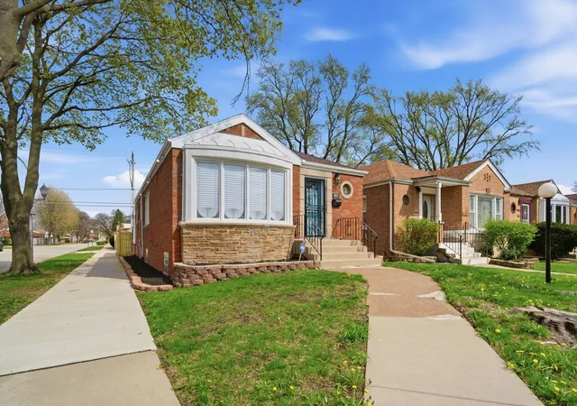 Photo 2 of Single family home for sale at 8801 S Clyde Ave, Chicago, IL 60617 | MLS# 12703982 | Listing updated on 2026-10-07