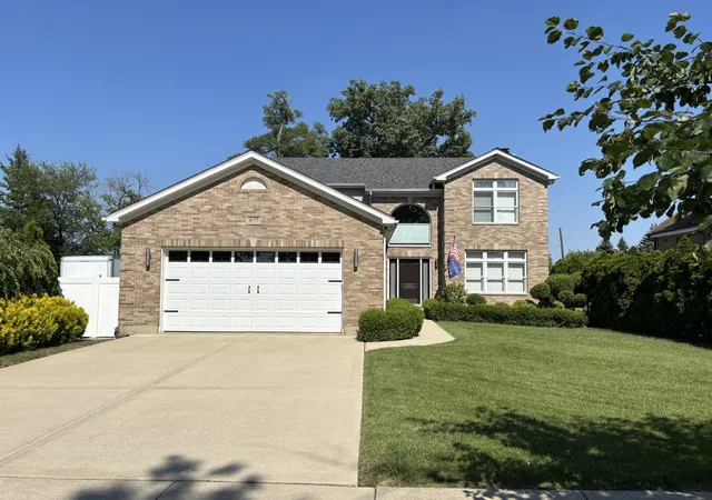 Single family home for sale at 877 John St, Bensenville, IL 60106 | MLS# 12706399
