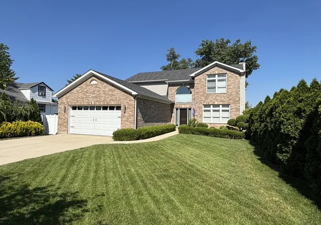 Photo 2 of Single family home for sale at 877 John St, Bensenville, IL 60106 | MLS# 12706399 | Listing updated on 2026-08-10