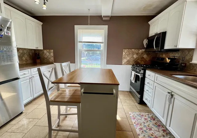 Photo 3 of Single family home for sale at 1711 N 73rd Court, Elmwood Park, IL 60707 | MLS# 12706608 | Listing updated on 2026-09-13