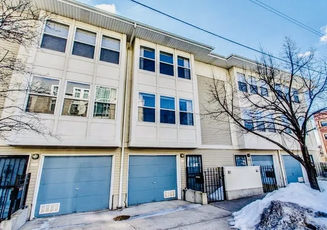 Photo 1 of Townhouse for sale at 1009 E 61st Street, Chicago, IL 60637 | MLS# 12706715 | Listing updated on 2026-07-22