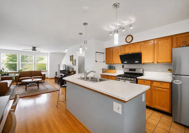 Photo 3 of Townhouse for sale at 1009 E 61st Street, Chicago, IL 60637 | MLS# 12706715 | Listing updated on 2026-07-22