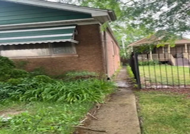 Photo 2 of Single family home for sale at 12559 S Michigan Ave, Chicago, IL 60628 | MLS# 12709187 | Listing updated on 2026-10-02
