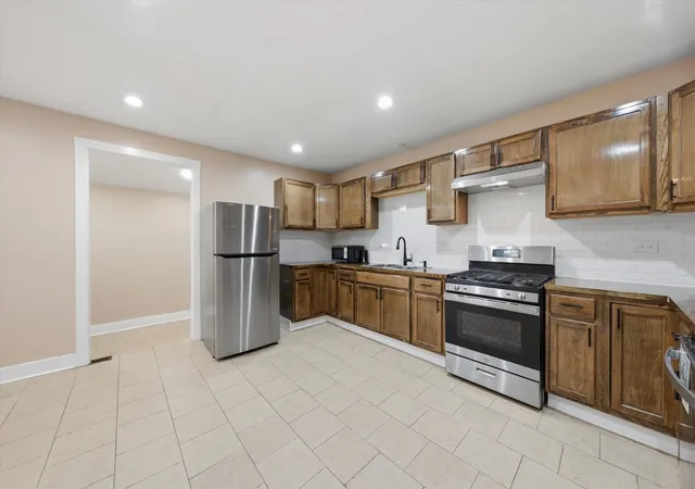 Photo 3 of Single family home for sale at 12206 S Union Ave, Chicago, IL 60628 | MLS# 12710306 | Listing updated on 2026-08-06