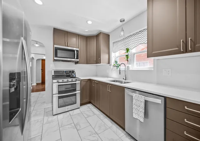 Photo 2 of Single family home for sale at 7730 S Paxton Ave, Chicago, IL 60649 | MLS# 12711040 | Listing updated on 2026-09-08
