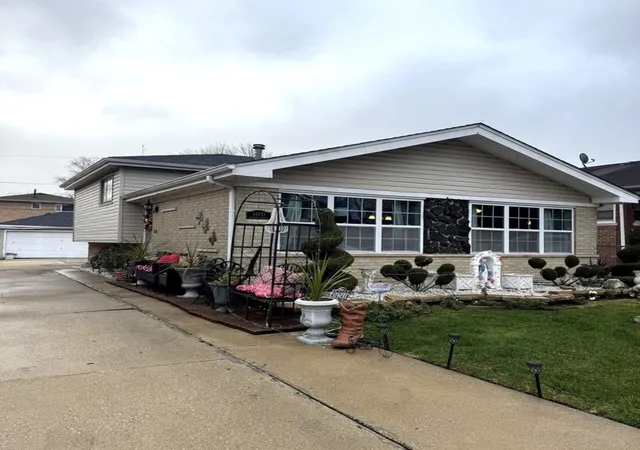 Single family home for sale at 14241 S Marquette Ave, Chicago, IL 60633 | MLS# 12711333