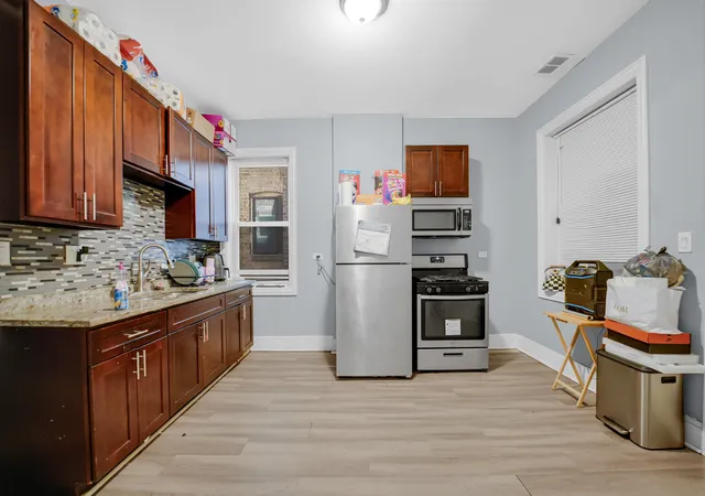 Photo 4 of Multi family home for sale at 5718 S Sangamon St, Chicago, IL 60621 | MLS# 12713465 | Listing updated on 2026-08-09