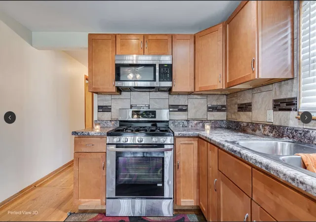 Photo 2 of Sale Pending at 8240 S Woodlawn Ave, Chicago, IL 60619 | MLS# 12714754 | Listing updated on 2026-08-05