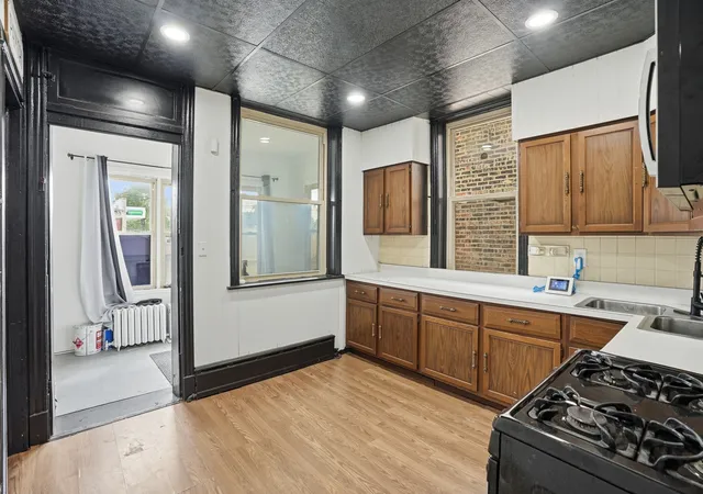 Photo 2 of Multi family home for sale at 7611 S Green St, Chicago, IL 60620 | MLS# 12715104 | Listing updated on 2026-09-30