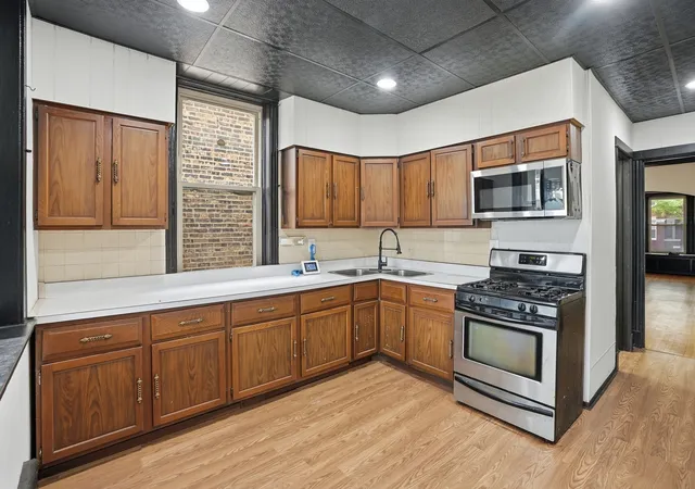 Photo 3 of Multi family home for sale at 7611 S Green St, Chicago, IL 60620 | MLS# 12715104 | Listing updated on 2026-09-30