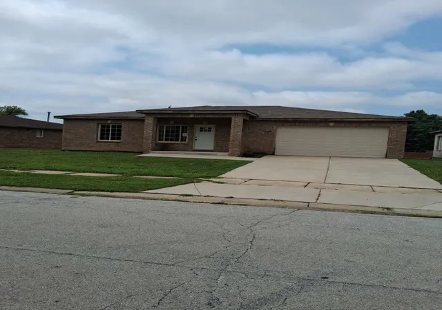 Single family home for sale at 13938 S Reeves Rd, Robbins, IL 60472 | MLS# 12716072