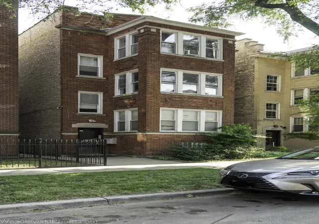 Photo 2 of Multi family home for sale at 2009 W Birchwood Ave, Chicago, IL 60645 | MLS# 12718073 | Listing updated on 2026-08-28