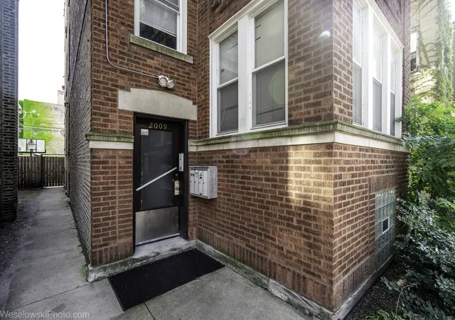 Photo 3 of Multi family home for sale at 2009 W Birchwood Ave, Chicago, IL 60645 | MLS# 12718073 | Listing updated on 2026-08-28