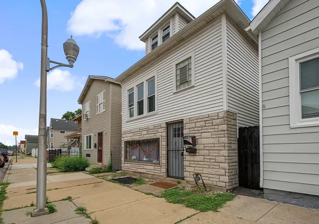 Photo 2 of Multi family home for sale at 13412 S Brandon Ave, Chicago, IL 60633 | MLS# 12718856 | Listing updated on 2026-08-04