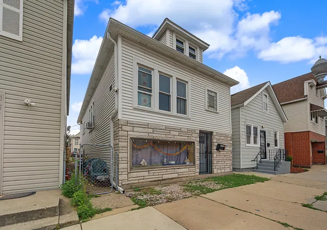Photo 3 of Multi family home for sale at 13412 S Brandon Ave, Chicago, IL 60633 | MLS# 12718856 | Listing updated on 2026-08-04