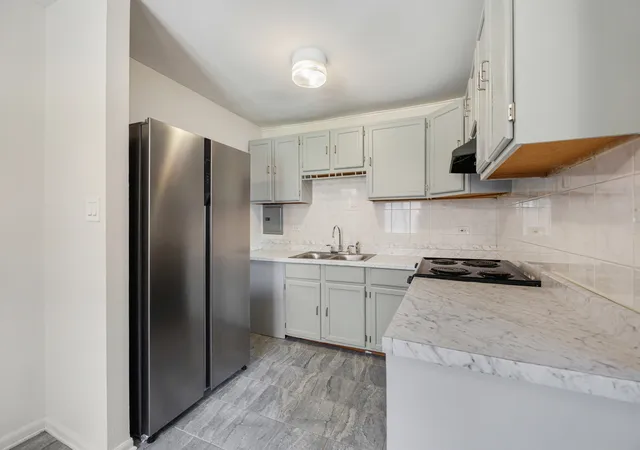 Photo 2 of Condo for sale at 2308 Algonquin Rd #7, Rolling Meadows, IL 60008 | MLS# 12720494 | Listing updated on 2026-09-15