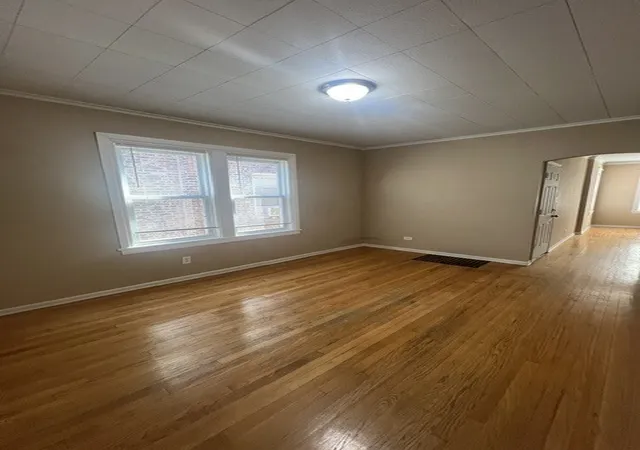 Photo 4 of Sale Pending at 1627 N Lotus Ave, Chicago, IL 60639 | MLS# 12720743 | Listing updated on 2026-08-14