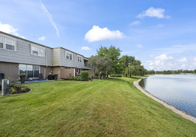 Photo 1 of Townhouse for sale at 670 Versailles Cir #D, Elk Grove Village, IL 60007 | MLS# 12722097 | Listing updated on 2026-09-24