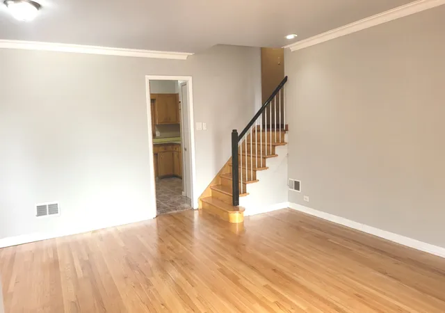 Photo 3 of Single family home for sale at 7023 S Bennett Ave, Chicago, IL 60649 | MLS# 12723009 | Listing updated on 2026-09-01