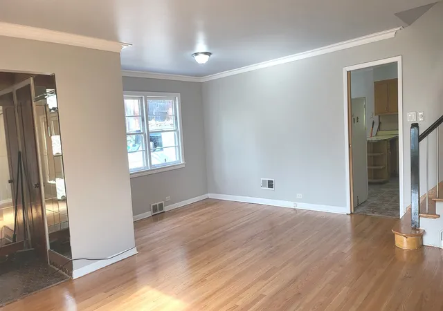 Photo 3 of Single family home for sale at 7023 S Bennett Ave, Chicago, IL 60649 | MLS# 12723009 | Listing updated on 2026-09-01
