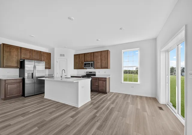 Photo 4 of Single family home for sale at 565 Arye Dr, Elgin, IL 60124 | MLS# 12723818 | Listing updated on 2026-09-24