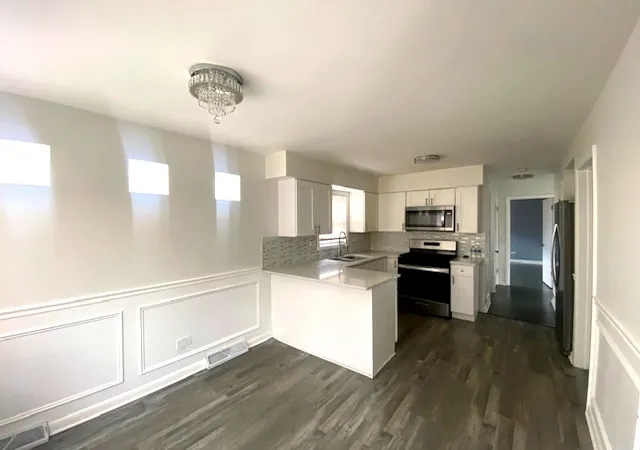 Photo 2 of Single family home for sale at 7955 S Wentworth Ave, Chicago, IL 60620 | MLS# 12724080 | Listing updated on 2026-08-25
