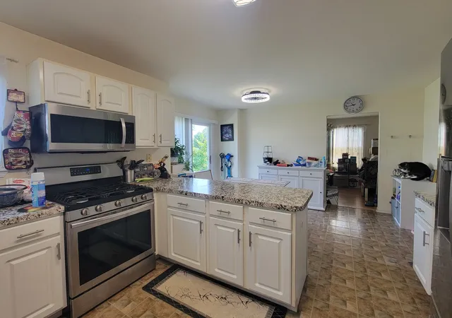 Photo 2 of Single family home for sale at 1202 E Greystone Dr, Round Lake Beach, IL 60073 | MLS# 12724309 | Listing updated on 2026-08-10