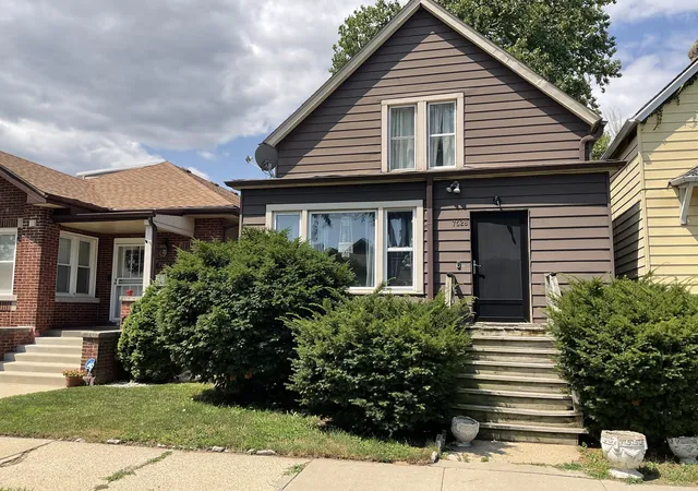 Single family home for sale at 7528 S Merrill Ave, Chicago, IL 60649 | MLS# 12724360