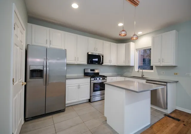 Photo 3 of Townhouse for sale at 710 E 51st Street, Chicago, IL 60615 | MLS# 12725874 | Listing updated on 2026-09-13