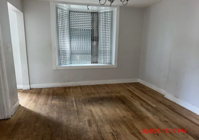 Photo 3 of Sale Pending at 7430 S Champlain Ave, Chicago, IL 60619 | MLS# 12727151 | Listing updated on 2026-08-13
