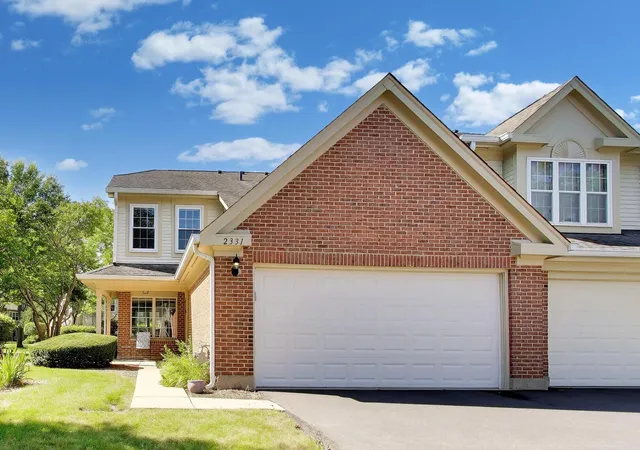 Photo 1 of Townhouse for sale at 2331 Sedgfield Ct, Schaumburg, IL 60194 | MLS# 12728248 | Listing updated on 2026-09-23