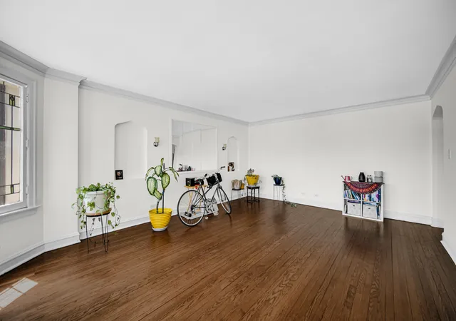 Photo 3 of Multi family home for sale at 7428 S Bennett Ave, Chicago, IL 60649 | MLS# 12729819 | Listing updated on 2026-09-15