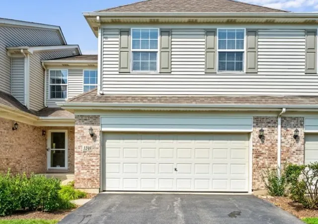 Photo 2 of Townhouse for sale at 1248 Bradley Cir, Elgin, IL 60120 | MLS# 12732361 | Listing updated on 2026-09-04