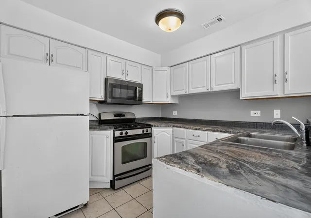 Photo 1 of Townhouse for sale at 4521 Province Town Dr, Country Club Hills, IL 60478 | MLS# 12732845 | Listing updated on 2026-09-12