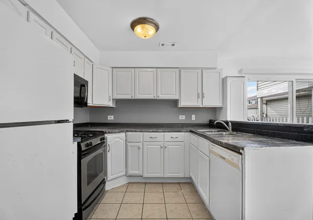 Photo 3 of Townhouse for sale at 4521 Province Town Dr, Country Club Hills, IL 60478 | MLS# 12732845 | Listing updated on 2026-09-12