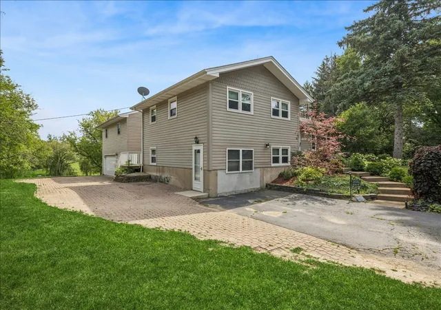 Photo 3 of Single family home for sale at 14101 Perkins Rd, Woodstock, IL 60098 | MLS# 12735166 | Listing updated on 2026-10-01