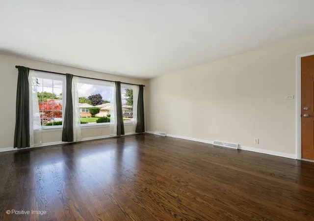 Photo 3 of Single family home for sale at 8211 Mango Ave, Morton Grove, IL 60053 | MLS# 12736000 | Listing updated on 2026-09-22